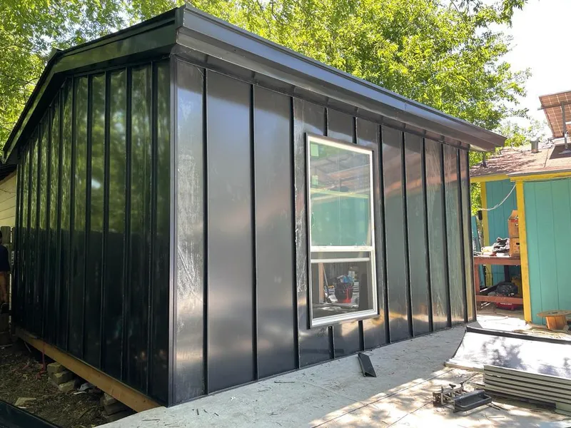 Black standing seam metal wall panels for Metal Roof Installation in La Crosse