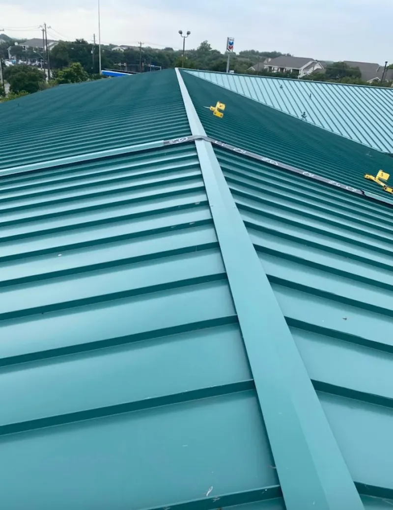 Green commercial metal roof ridge and valley for Metal Roof Repair in La Crosse